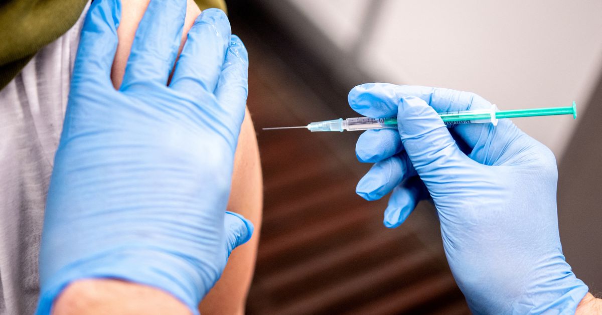 Omicron spike in most vaccinated German state heralds nationwide surge