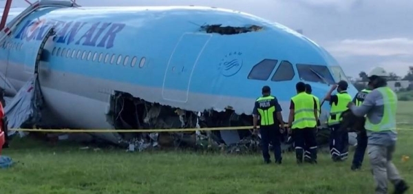 Korean Air plane overruns Cebu runway in bad weather; all safe